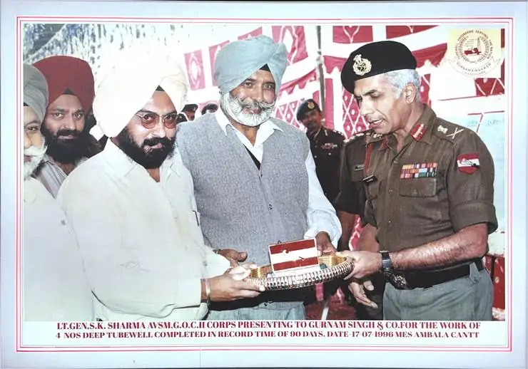 Lt. Gen. S.K. Sharma, AVSM, G.O.C. II Corps presenting an award to Gurnam Singh & Company, 1996